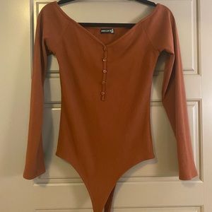 POPULAR21 burnt orange bodysuits, size large